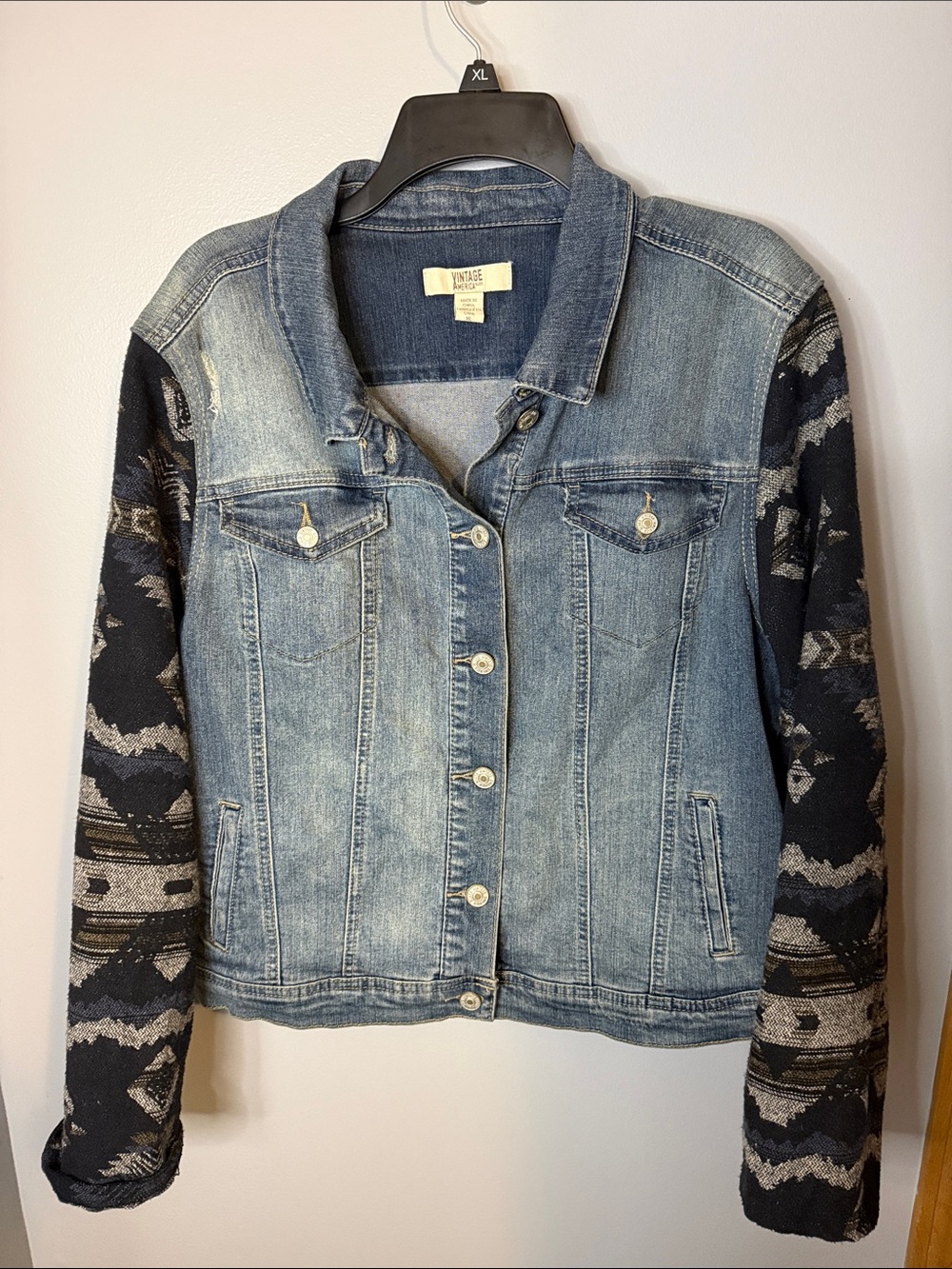 Light Wash Denim Jacket with Patterned Black Sleeves